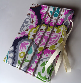 Personal Progress Packet Tutorial featured by top US sewing blog, Ameroonie Designs