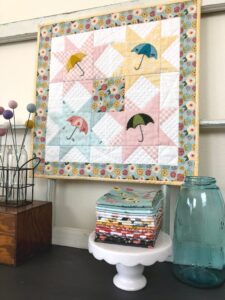 Mini quilt pattern with Sister Prairie fabrics, featured by top US quilting blog, Ameroonie Designs