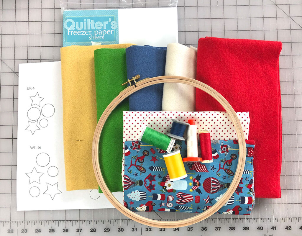 wool applique supplies- woven wool, thread, embroidery hoop, fabric, freezer paper