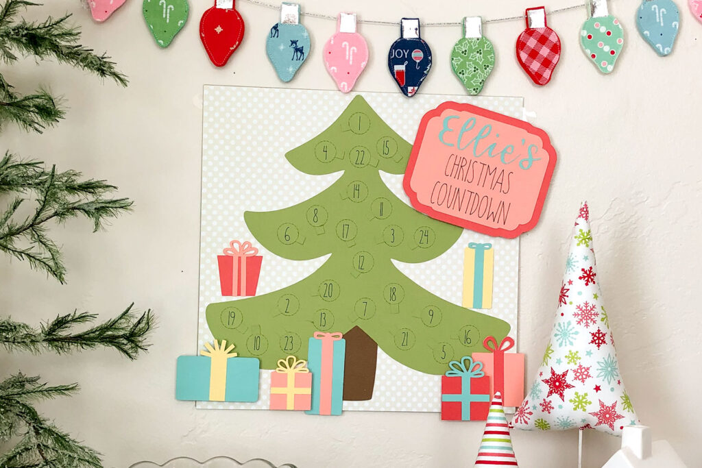 Personalized Christmas Countdown featured by top US craft blog Ameroonie Designs: image of paper Christmas Countdown and holiday decorations.