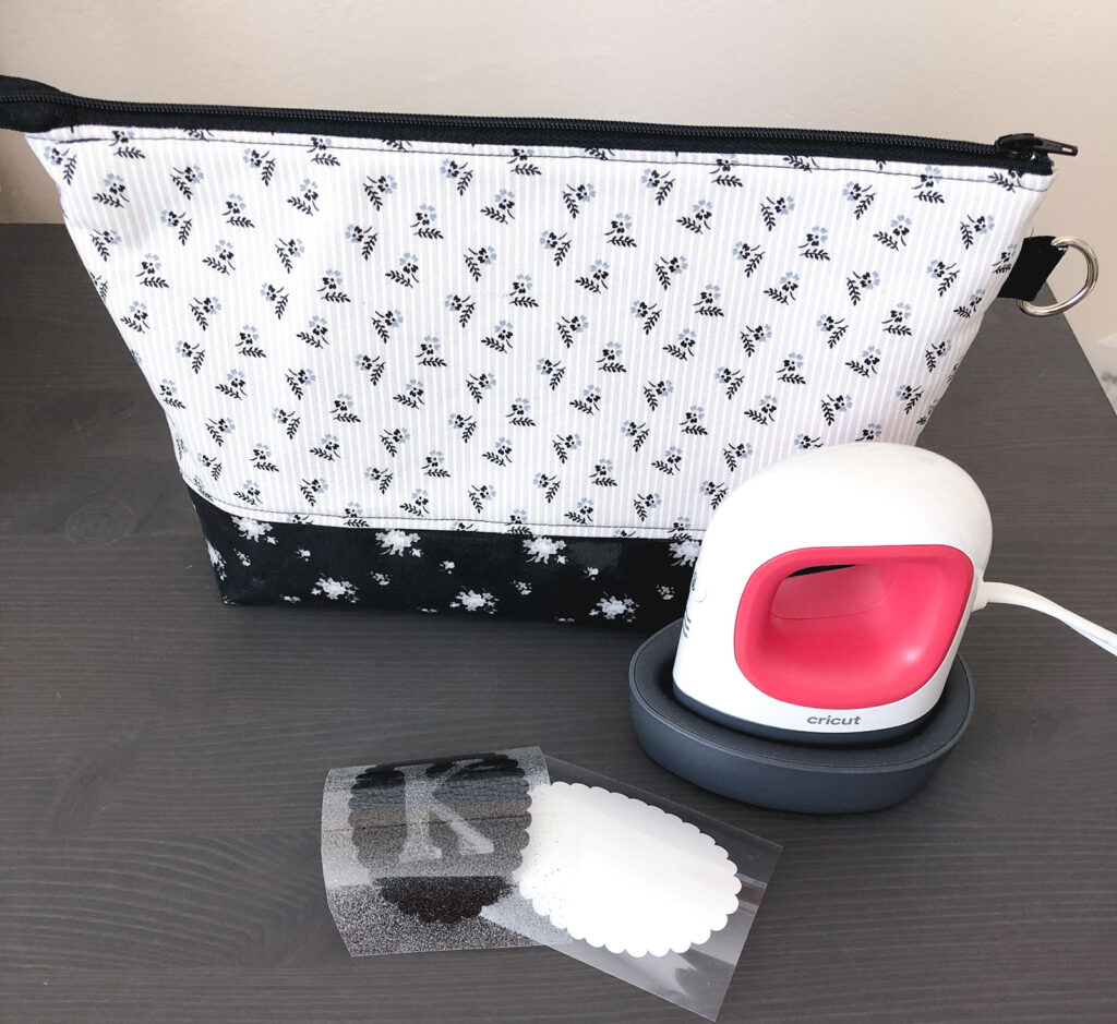 Personalized Zipper Pouch Tutorial featured by top US sewing blog Ameroonie Designs: supplies for the tutorial include a zipper pouch, monogram cut out of iron on vinyl and Cricut EasyPress Mini.