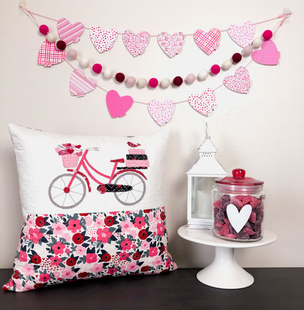DIY Valentine Countdown Banner with the Cricut Maker featured by top US craft blog Ameroonie Designs: image of countdown banner with pillow and decor
