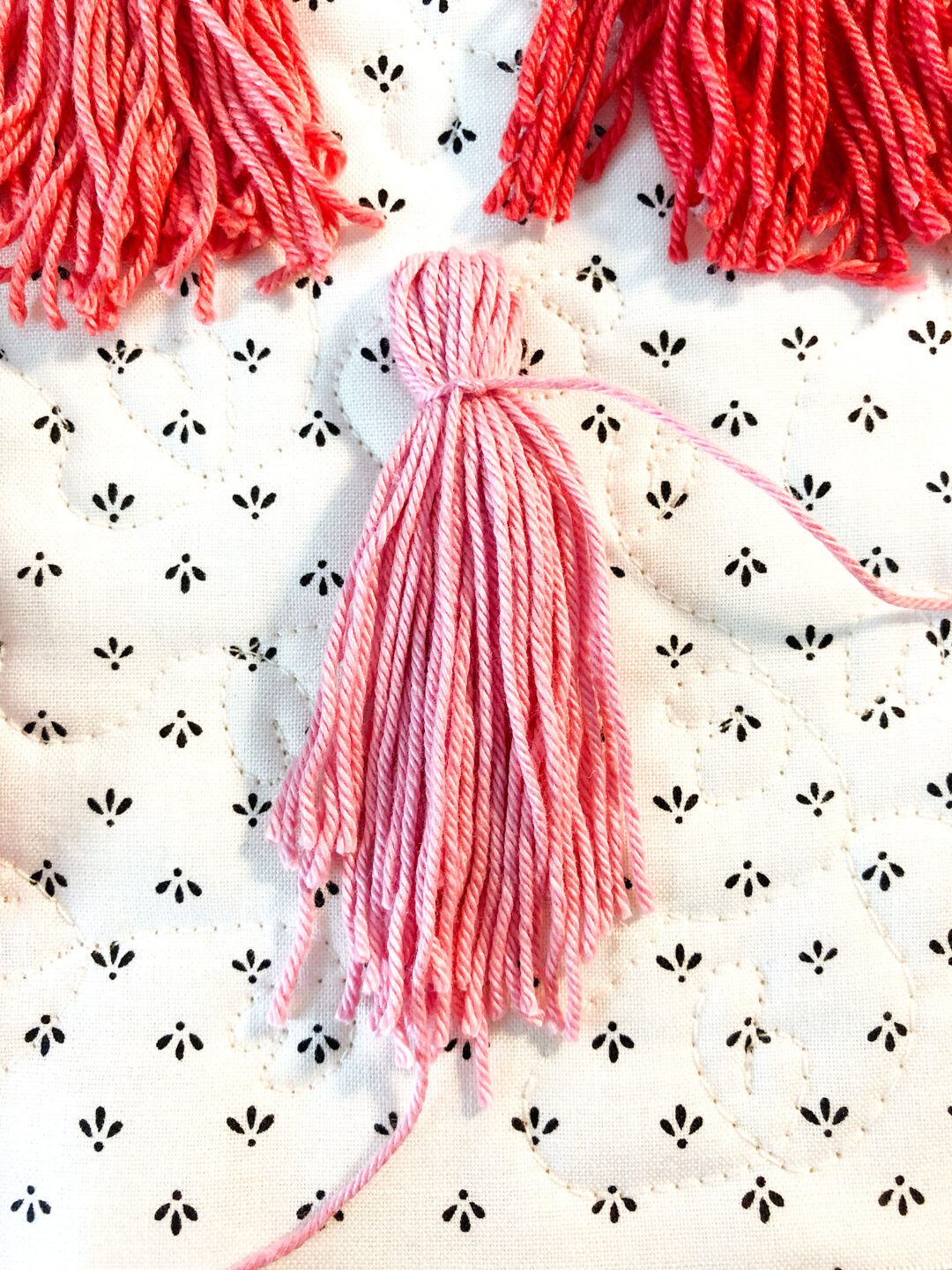 Tassel Pillow DIY - Ameroonie Designs | Customize your own accent pillow