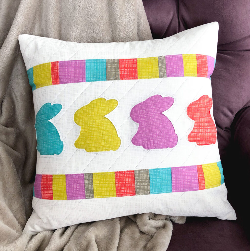 "Bunny Hop" is a Free Easter Quilted Pillow Pattern designed by Amy from Ameroonie Designs!