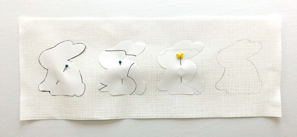 Bunny Hop Pillow tutorial by Top US sewing blog Ameroonie Designs: image of positioning bunny templates for applique.