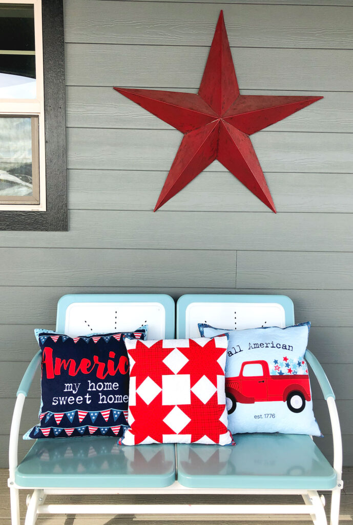 Patriotic Porch Pillow Tutorial by Top US sewing blog Ameroonie Designs. Image of: front porch with glider and patriotic pillows for decoration