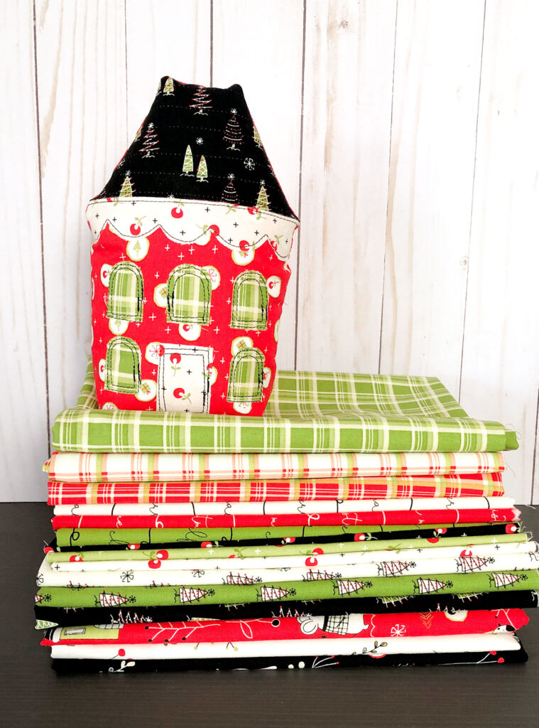 Fabric Christmas Village by Top US sewing blog Ameroonie Designs image of:prints in the Merry Little Christmas fabric line.