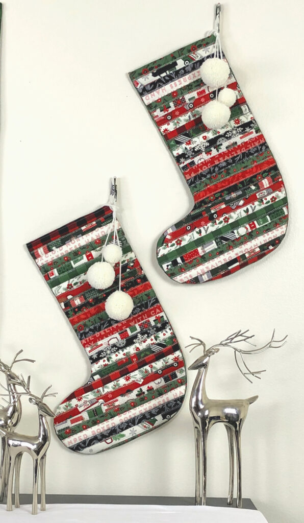 Fabric Christmas Village by Top US sewing blog Ameroonie Designs image of: stockings made with 2 1/2" precut fabric strips.