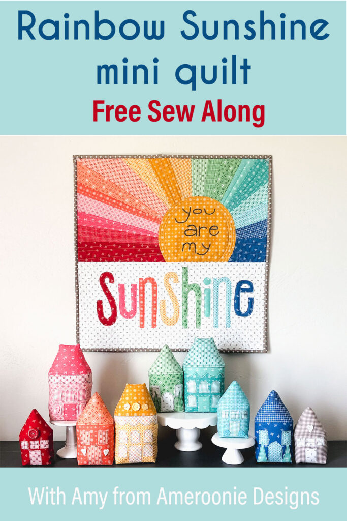 Rainbow Sunshine Mini quilt sew along with top US sewing blog Ameroonie Designs. Image of mini quilt with fabric stuffed houses.