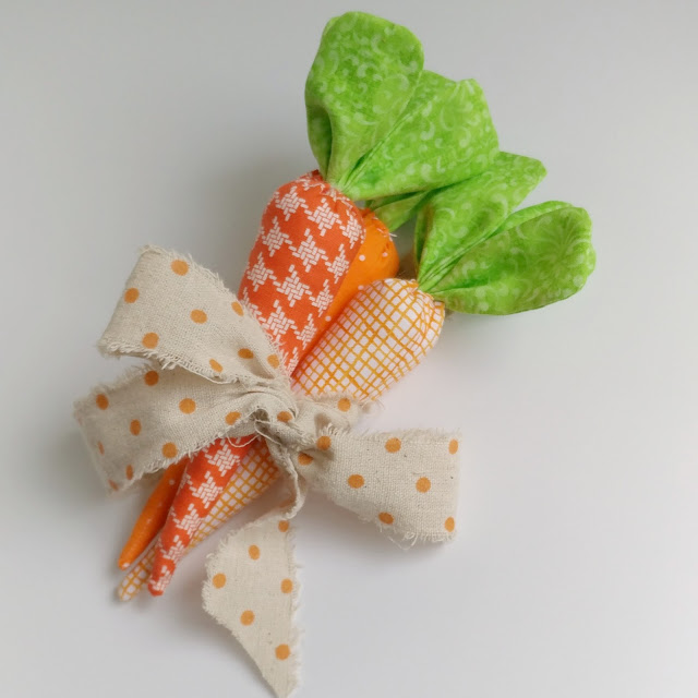 Sewing Tutorials: How to Make Fabric Carrots, a tutorial featured by top US sewing blog, Ameroonie Designs: Tie your fabric carrots into a bunch with a bright ribbon to create a fun accent piece