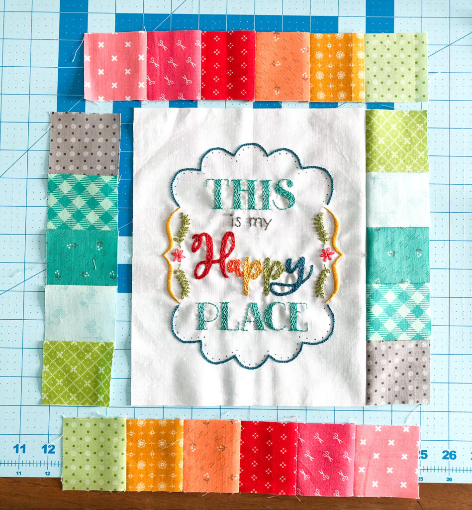 Turn your embroidery into a stunning mini quilt by Top US sewing blog Ameroonie Designs. Image of adding patchwork borders to mini quilt.