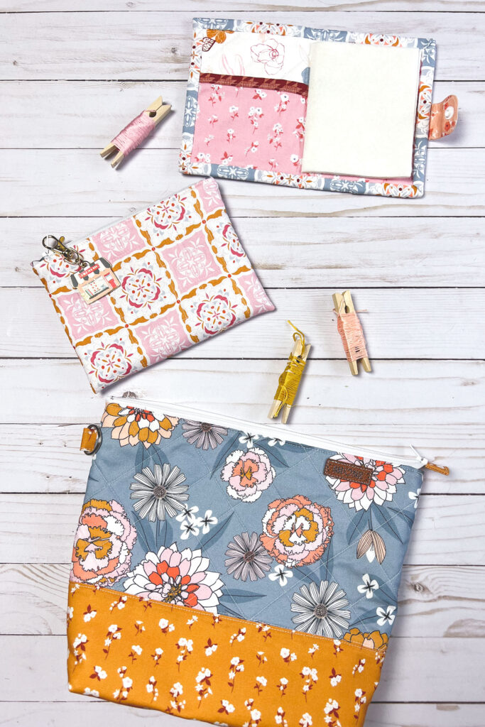 Practical projects to organize your hand sewing by Top US sewing blog Ameroonie Designs. Image of open needle book, small zipper pouch and extra large zipper pouch.