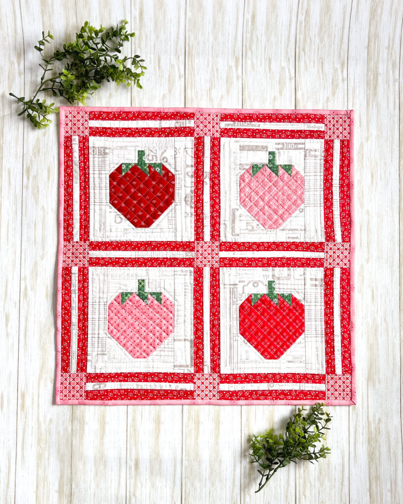 https://amerooniedesigns.com/wp-content/uploads/2022/04/strawberry-mini-lori-hold-819x1024.jpg