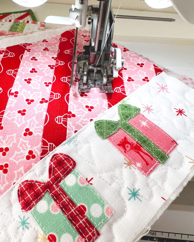 Five quick and easy tips for quilting small projects by Top US sewing blog Ameroonie Designs. Image of walking foot stitching straight lines onto mug rug.